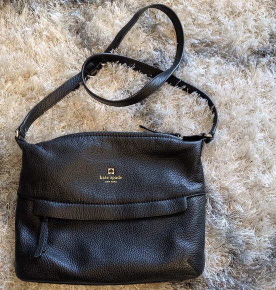 kate spade Handbags - Kate Spade black 100 leather cross body